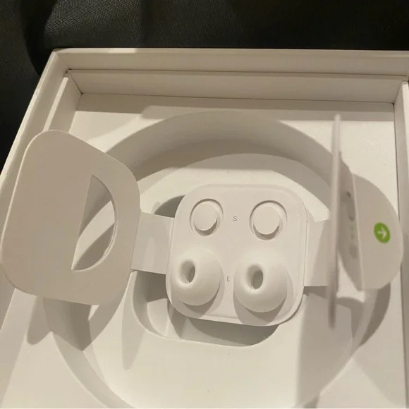 AirPod Pros, MagSafe Charging Case With Cleaning tool included.